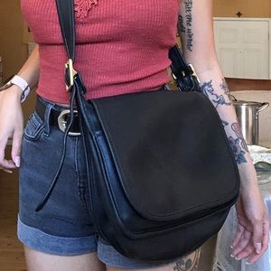 Vintage coach legacy saddle flap